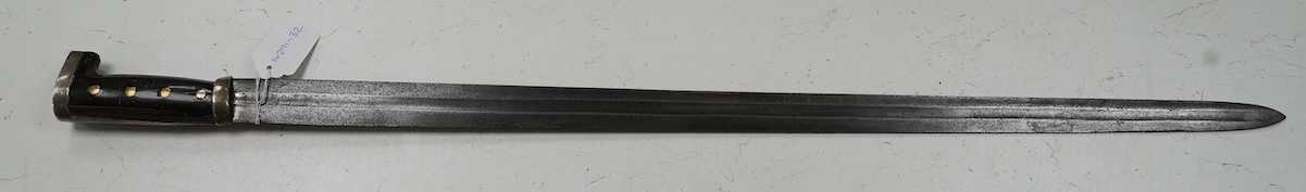 A Mexican sword machete, broad blade cut with a single fuller, with silver mounted horn hilt, blade 81cm. Condition - good